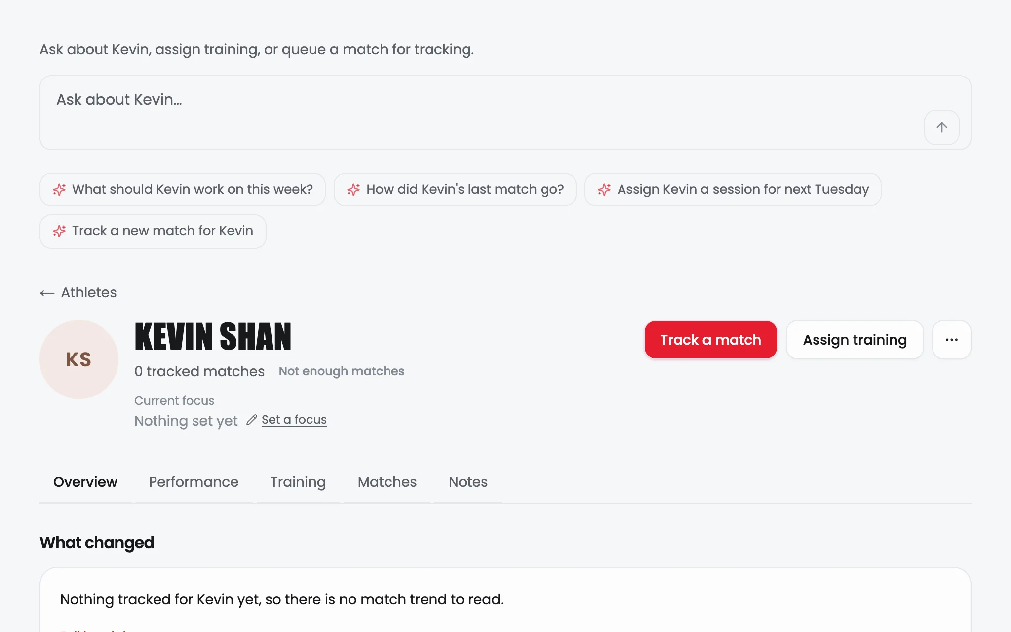 An athlete's page: a question box with suggested questions, the athlete's name and tracked match count, Track a match and Assign training buttons, and the Overview, Performance, Training, Matches and Notes tabs.